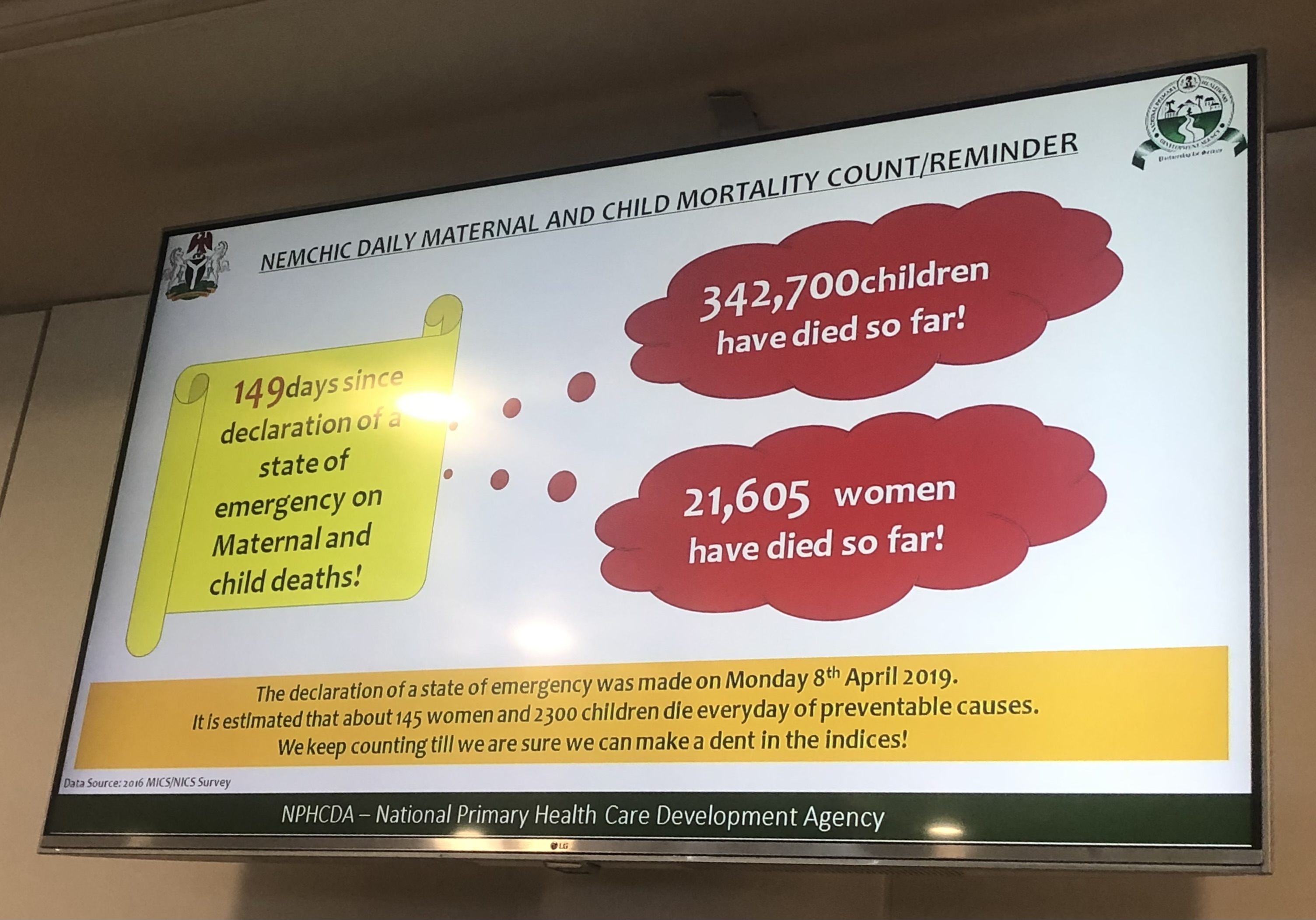 A picture of a screen showing maternal healh data points in the NPHCDA offices.